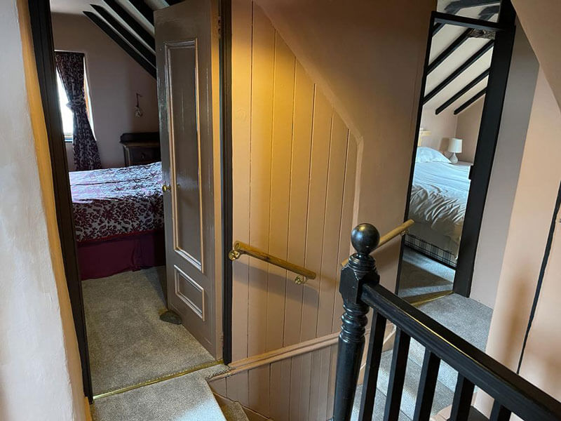 Doors to both upstairs double bedrooms at Holly Cottage, Boggle Hole