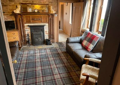 Lounge fireplace at Holly Cottage Boggle Hole North Yorkshire